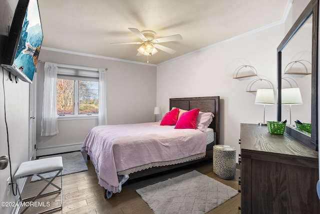 bedroom featuring hardwood / wood-style floors, ceiling fan, ornamental molding, and a baseboard radiator