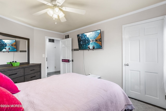 bedroom featuring ceiling fan and ornamental molding