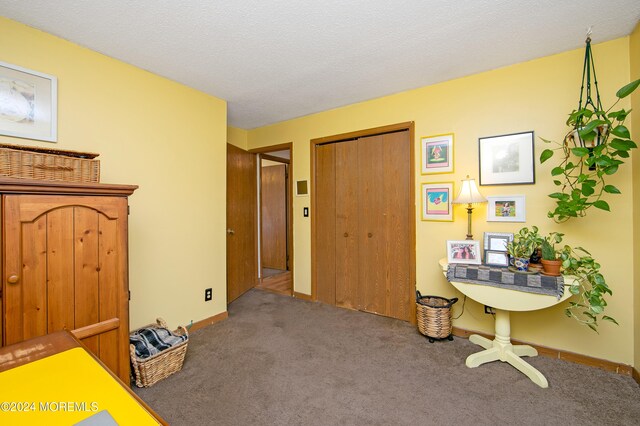 interior space with a textured ceiling