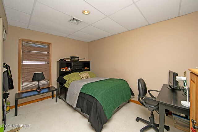 bedroom with a drop ceiling