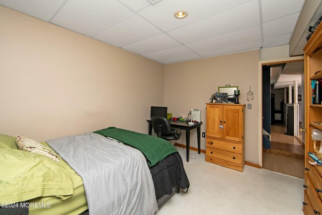 bedroom with a drop ceiling