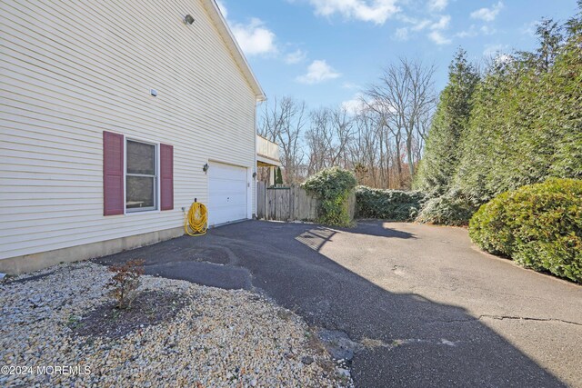 view of home's exterior with a garage