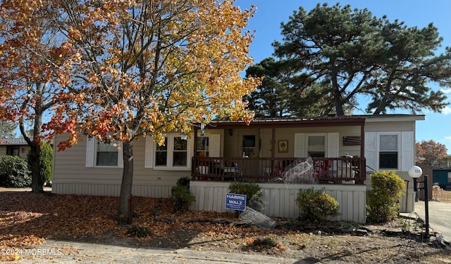 manufactured / mobile home with a porch