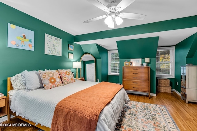 bedroom featuring ceiling fan and wood-type flooring