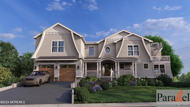 view of front of house with a porch, a garage, and a front yard