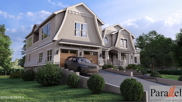 view of front of home with a garage and a front lawn