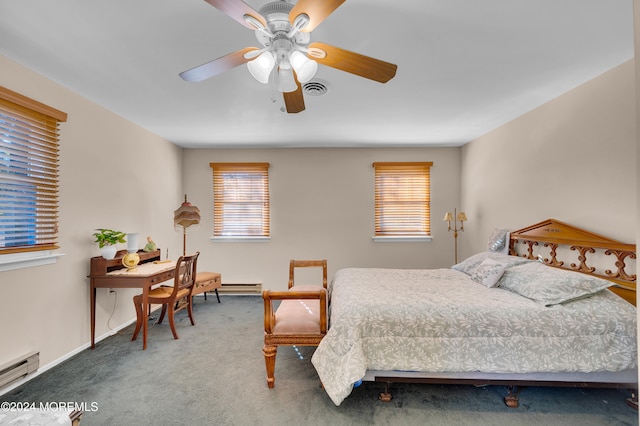 carpeted bedroom featuring ceiling fan, multiple windows, and baseboard heating