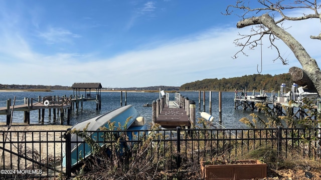 view of dock with a water view