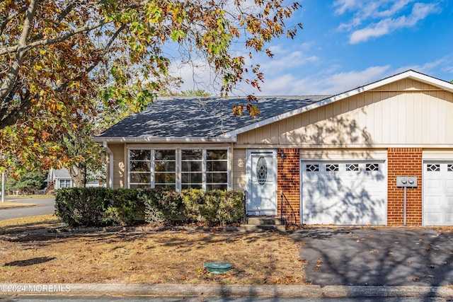 view of front of property featuring a garage