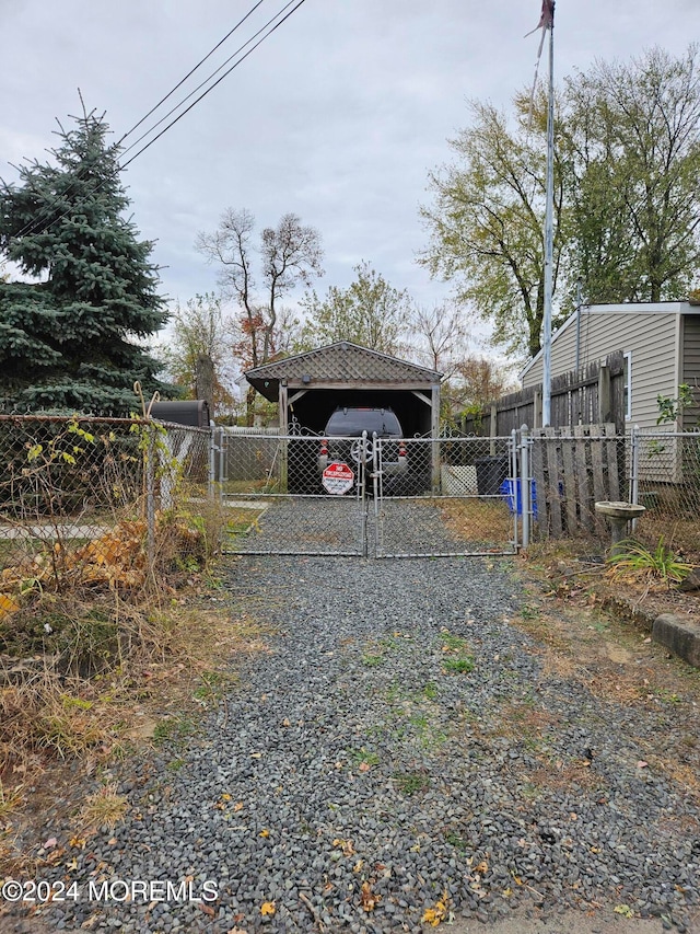 exterior space with a carport