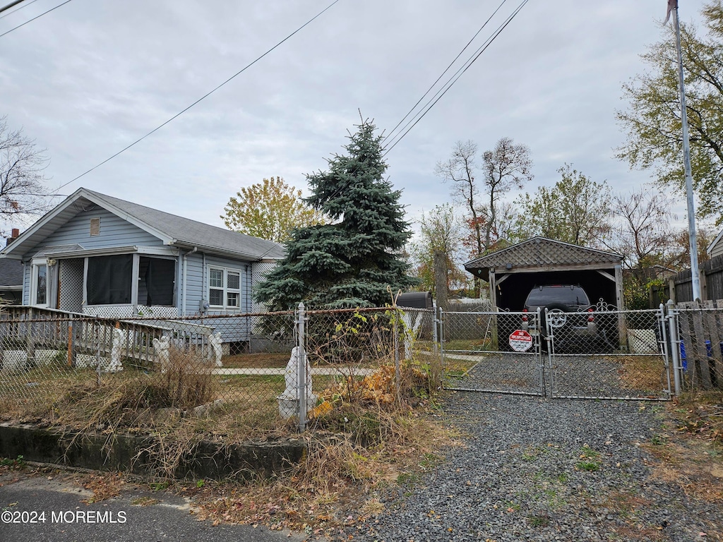 view of home's exterior featuring a carport