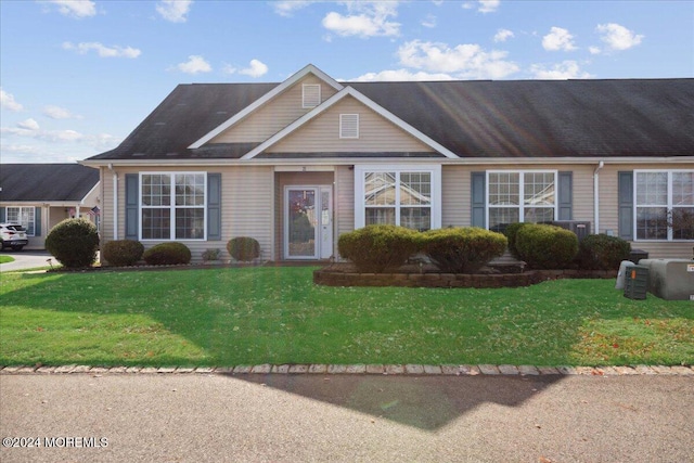 view of front of house with a front lawn