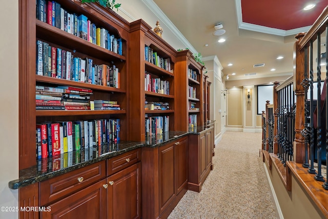 hall featuring crown molding, recessed lighting, baseboards, and light carpet