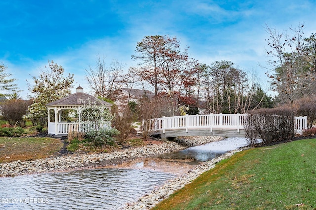 exterior space featuring a gazebo and a yard