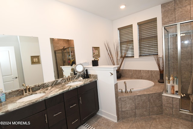 bathroom with vanity, tile patterned floors, and separate shower and tub