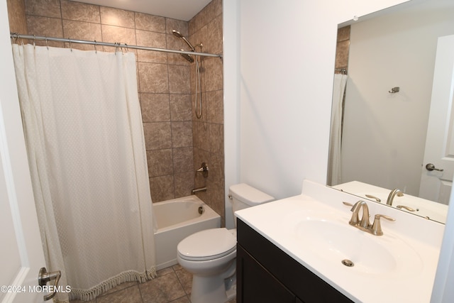 full bathroom with vanity, shower / bath combo with shower curtain, tile patterned flooring, and toilet