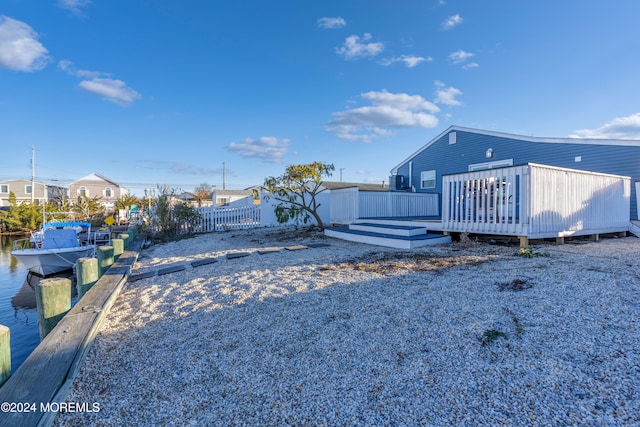 view of yard with a wooden deck