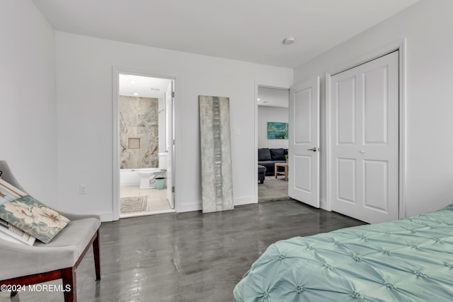 bedroom featuring ensuite bathroom and a closet