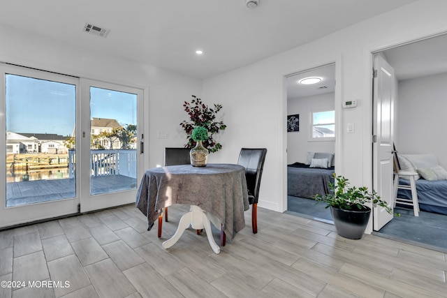 dining area with light wood-type flooring