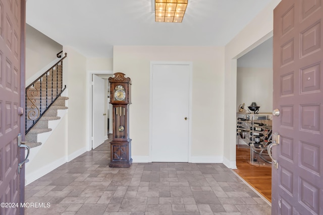 foyer with hardwood / wood-style flooring