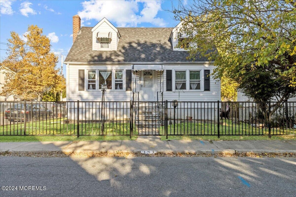 view of new england style home