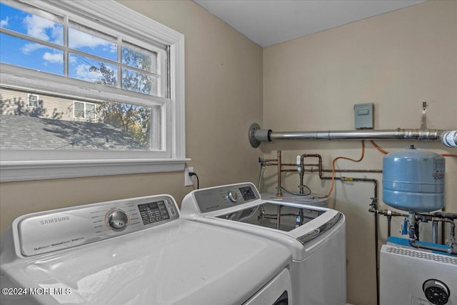 laundry area featuring washer and clothes dryer