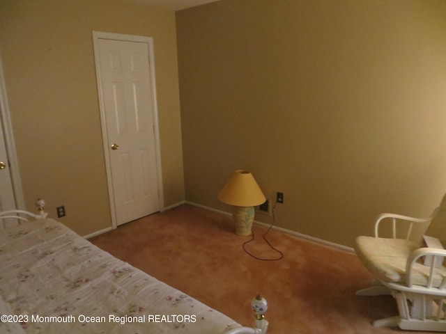 unfurnished bedroom with carpet and baseboards