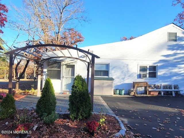 view of home's exterior featuring cooling unit