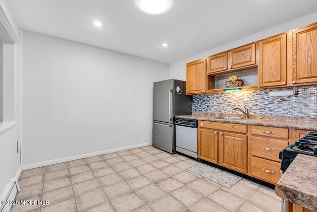 kitchen featuring appliances with stainless steel finishes, a sink, decorative backsplash, and open shelves