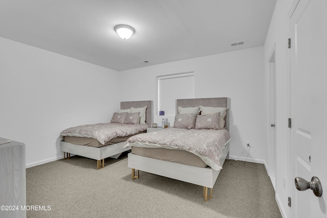 bedroom featuring carpet flooring