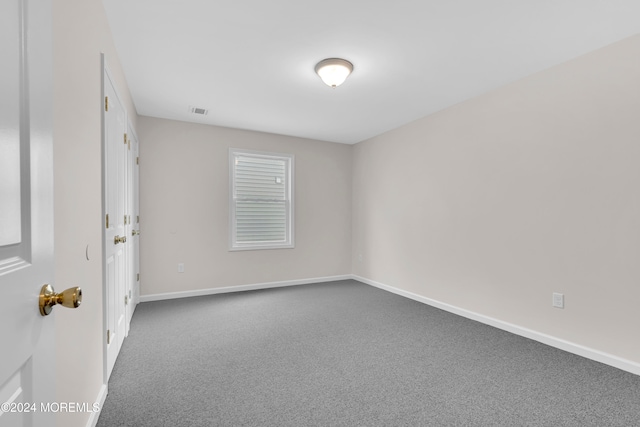 empty room featuring carpet