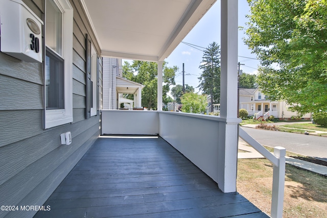 balcony featuring a porch