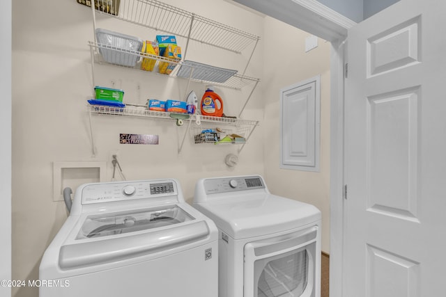 laundry area featuring washer and clothes dryer