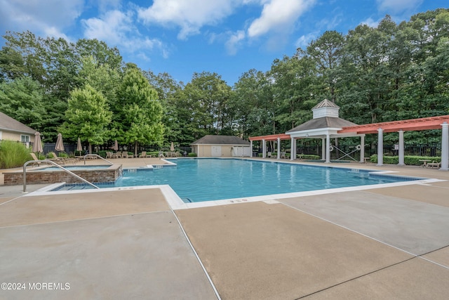 view of pool featuring a gazebo and a patio area