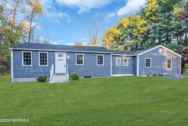 ranch-style home with a front lawn