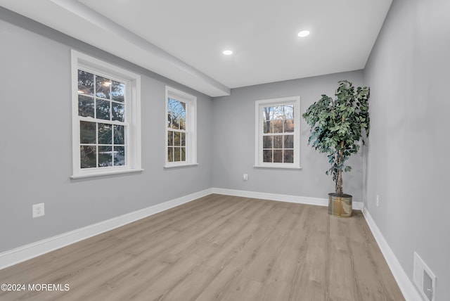 empty room with light wood-type flooring