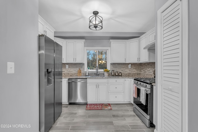 kitchen featuring white cabinetry, sink, and appliances with stainless steel finishes