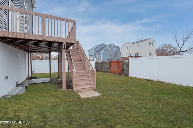 view of yard with a wooden deck