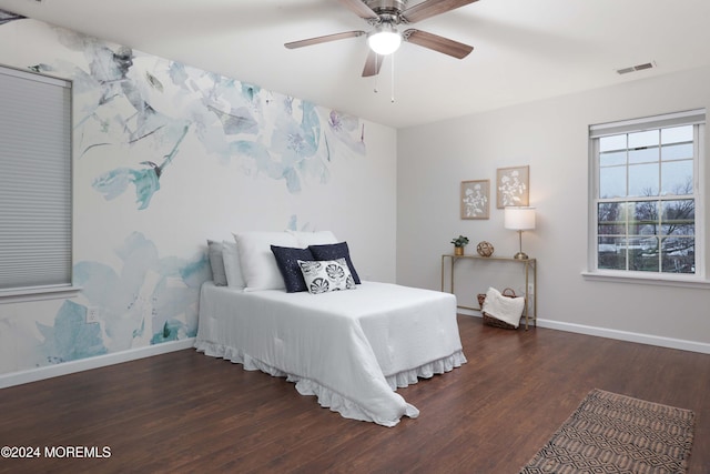 bedroom featuring dark hardwood / wood-style floors and ceiling fan