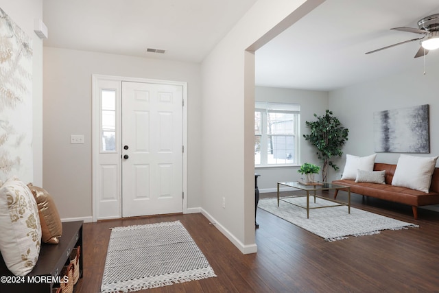 foyer featuring dark hardwood / wood-style flooring and ceiling fan