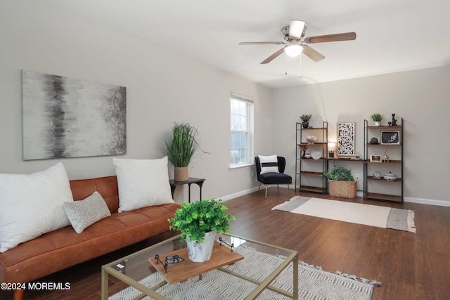 living room with hardwood / wood-style flooring and ceiling fan