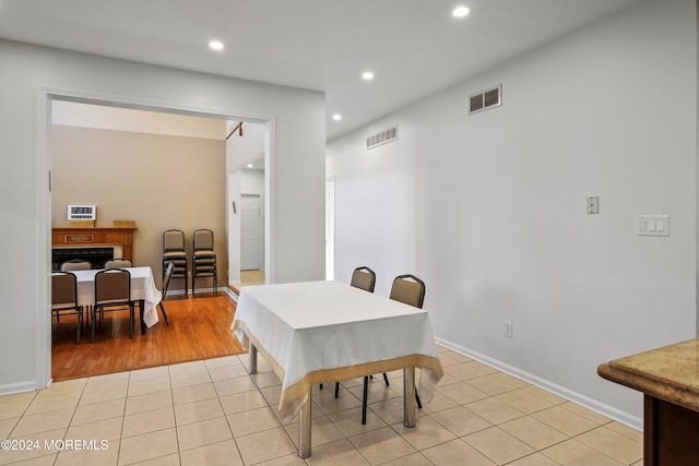 dining space with light wood-type flooring