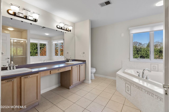 full bathroom featuring tile patterned floors, vanity, independent shower and bath, and toilet