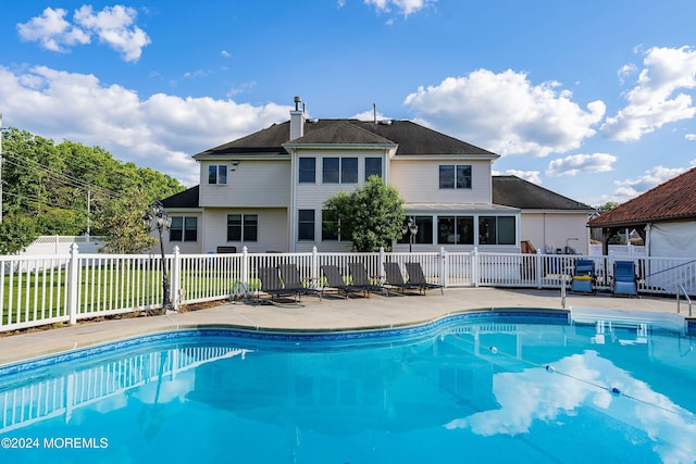 view of pool featuring a patio area