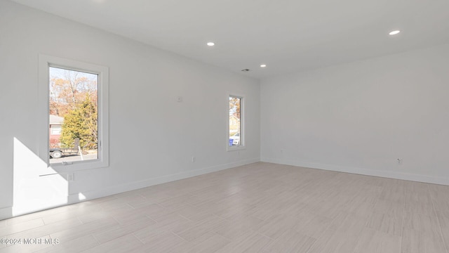 spare room with a wealth of natural light