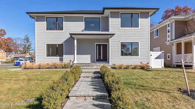 view of front of home featuring a front yard