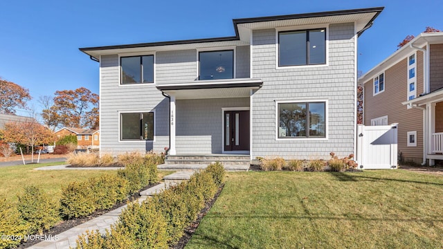 view of front of home featuring a front lawn