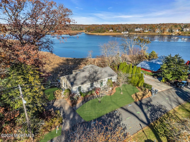 drone / aerial view with a water view