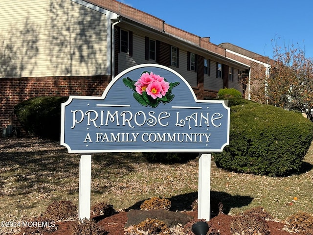 view of community sign