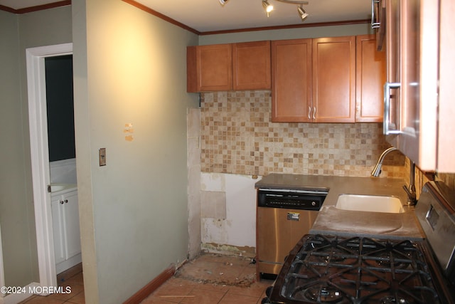 kitchen with dishwasher, backsplash, sink, ornamental molding, and light tile patterned floors